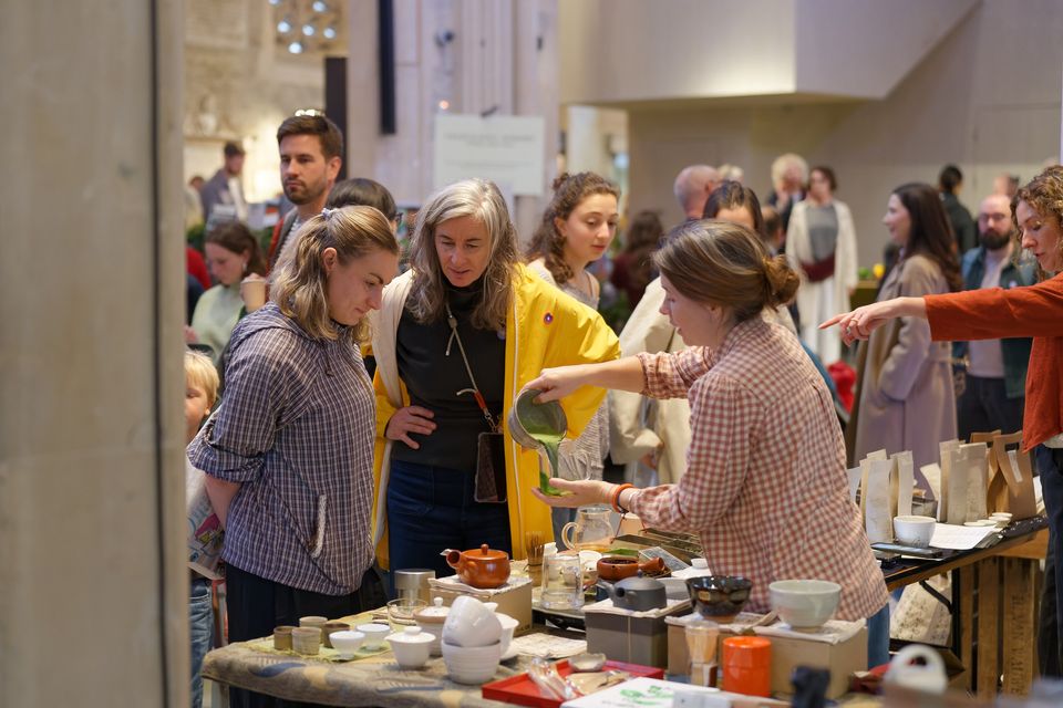 Visitors meeting independent food makers in the market hall